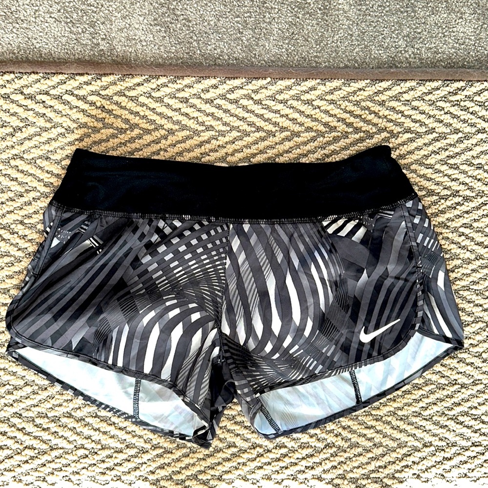 Women’s Nike athletic shorts. Back zipper pocket. Perfect condition. NWOT.